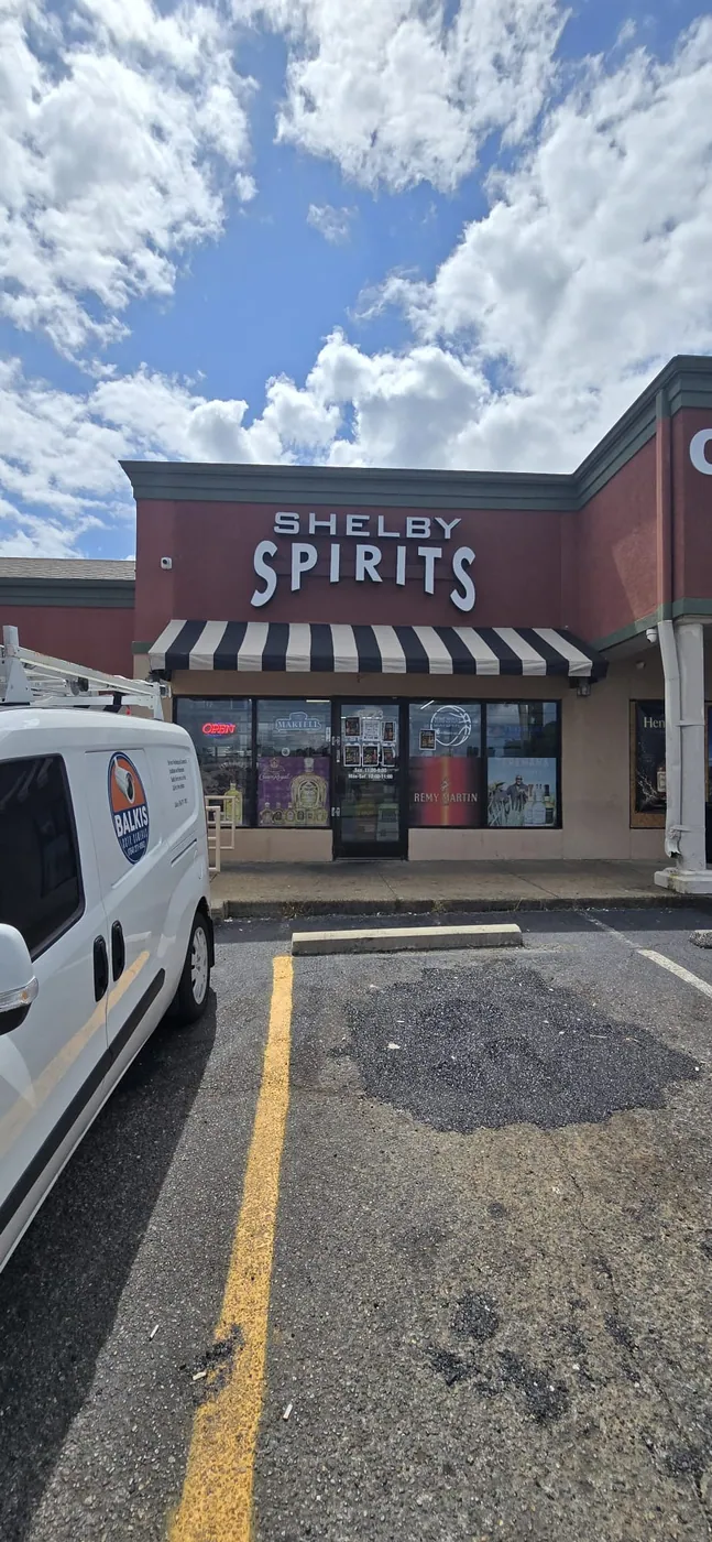 Balkis Cameras van outside Shelby Spirits