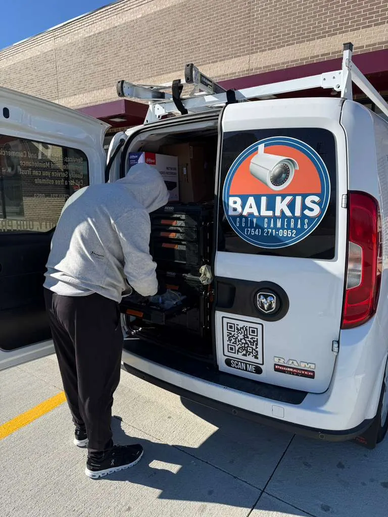 Balkis Cameras service van at a job site
